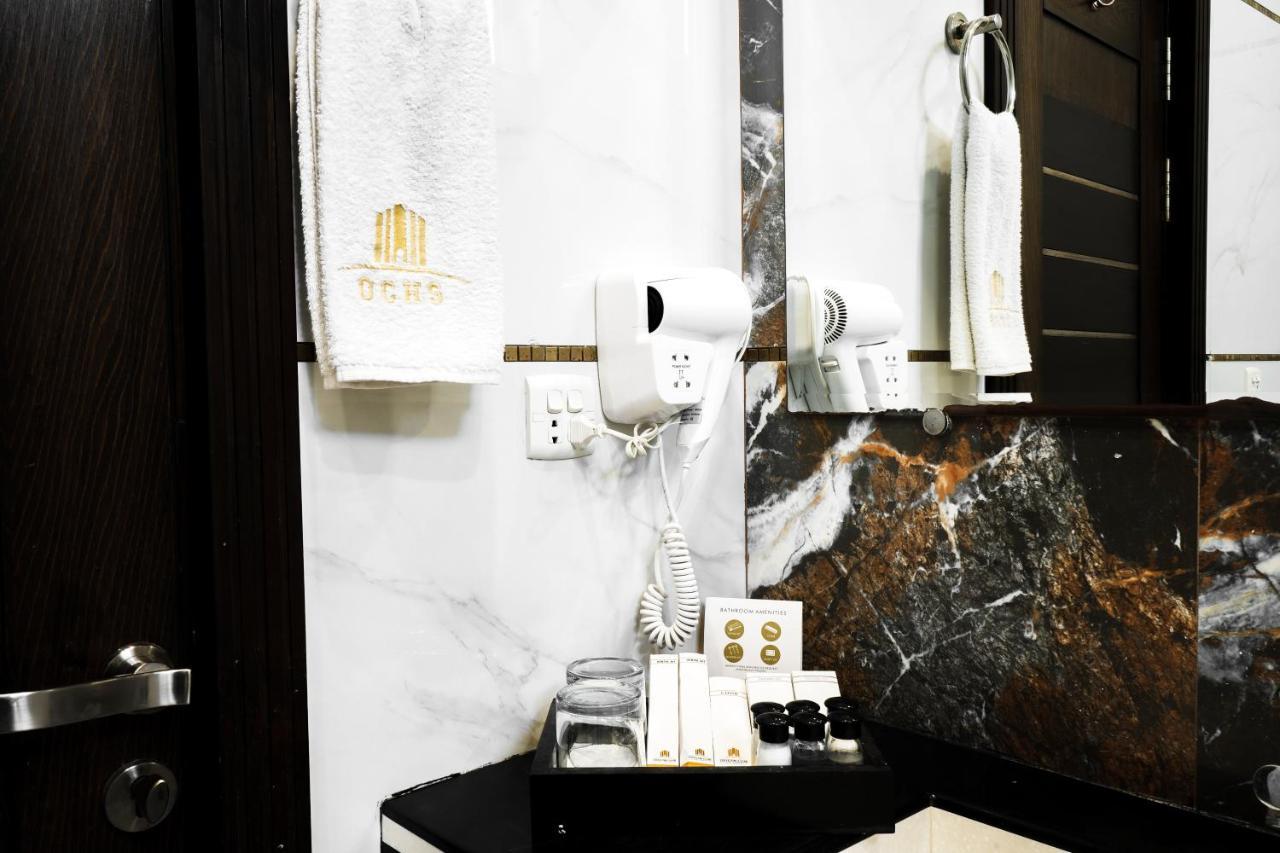 Oxygym Club Hotel & Suites Файсалабад Екстериор снимка